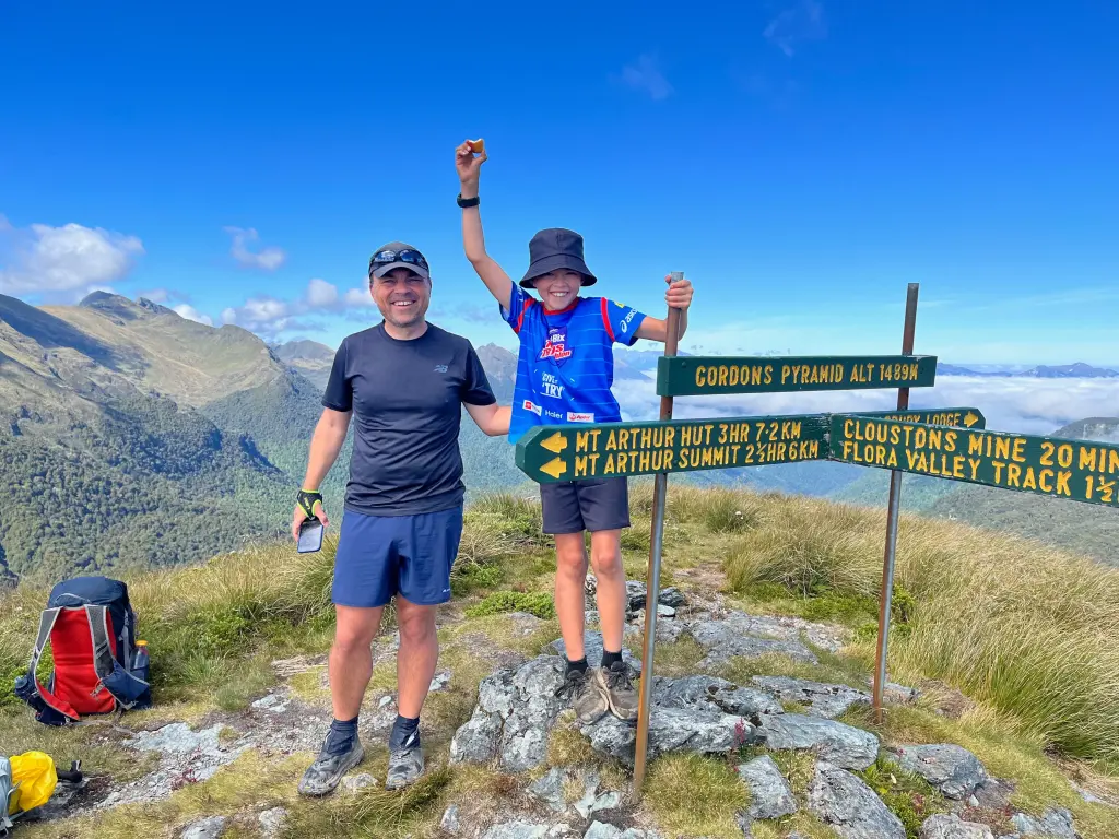 Brendyn and his son on top of Gordon's pyramid in the Kahurangi.